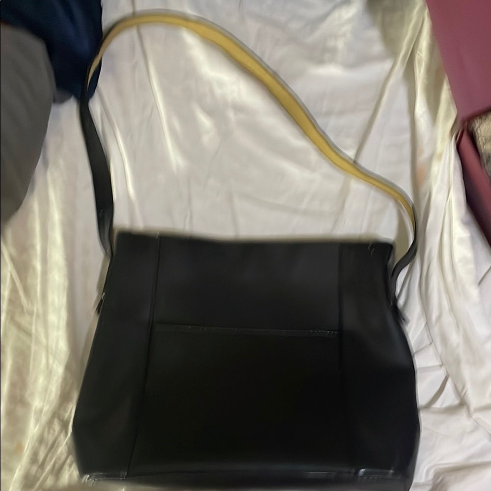 Mondani Black and Tan Shoulder Bag with Flap Closure